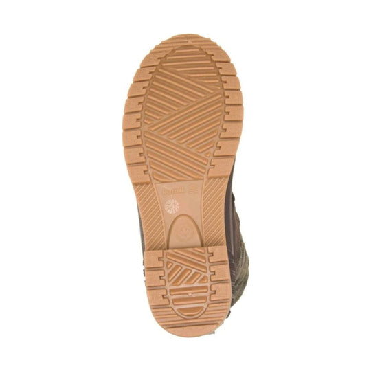 Tan rubber boot outsole with deep tread and traction grooves