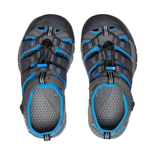 Pair of black and blue closed-toe sandals with bungee laces and toe caps, top view