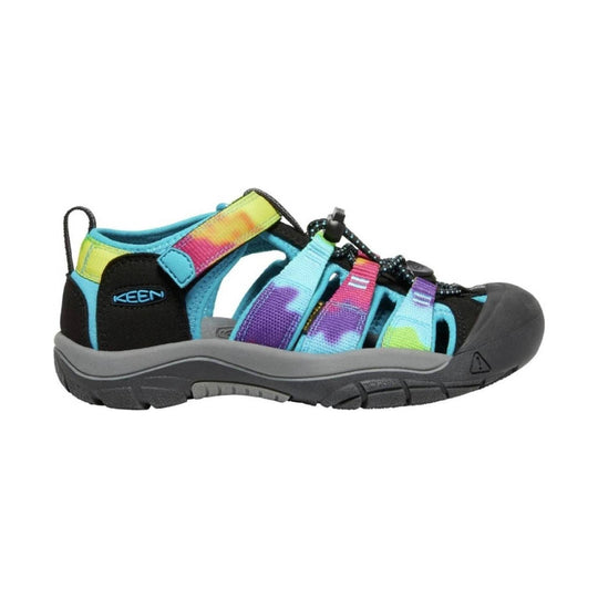Closed-toe hiking sandal with rainbow straps, black toe cap, and gray sole