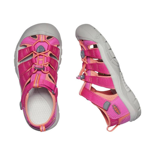 Pink and coral closed-toe kids' sandal with gray rubber toe cap and bungee straps