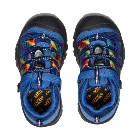 Blue children’s closed-toe hiking sandals with rainbow straps and black rubber toe caps
