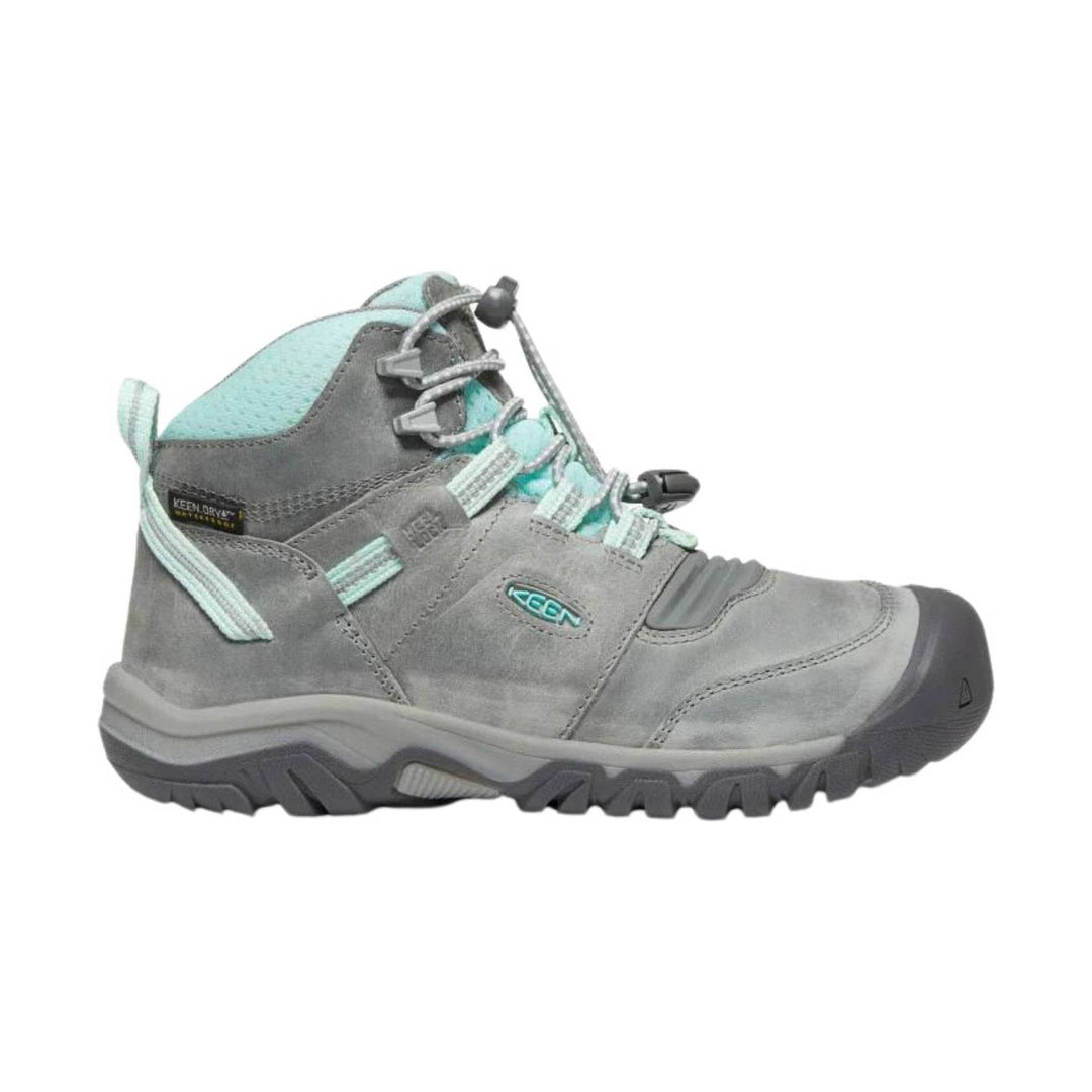 Gray mid-height hiking boot with teal accents, bungee laces, and rugged tread sole