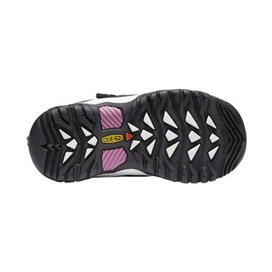 Black rugged hiking shoe outsole with white triangular cutouts, pink panels, and a yellow KEEN logo
