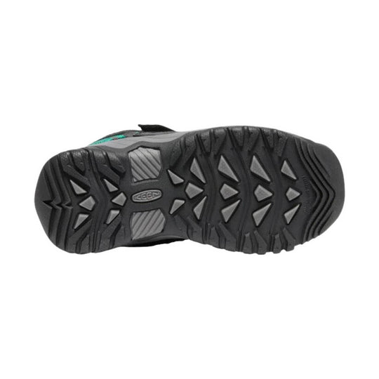 Black hiking shoe outsole with aggressive tread and KEEN logo