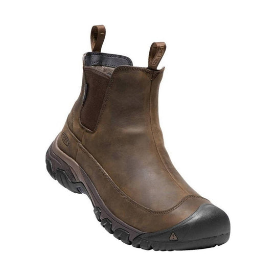 Brown pull-on winter boot with black rubber toe cap and rugged lug sole