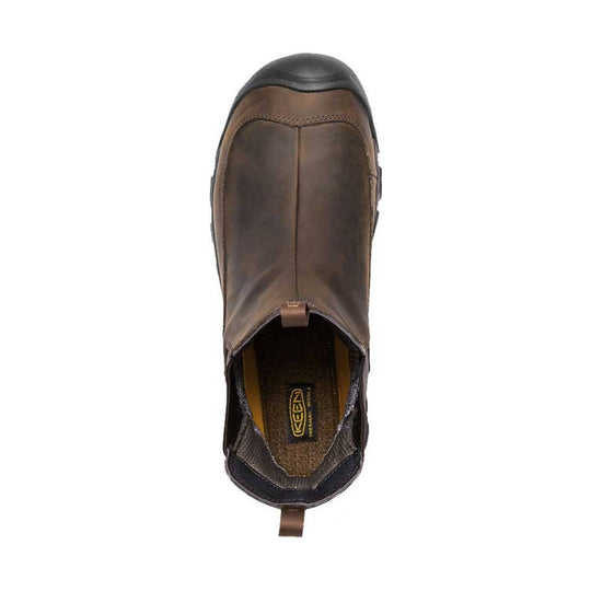 Brown pull-on winter boot with black rubber toe cap and rear pull tab, viewed from above