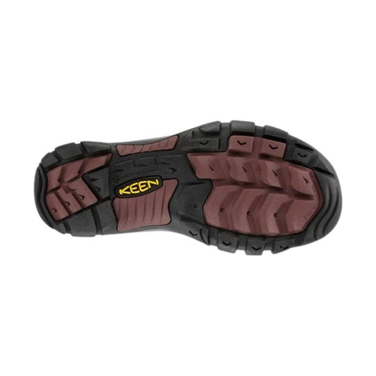 Boot outsole with black rubber tread and brown lug inserts, showing KEEN logo
