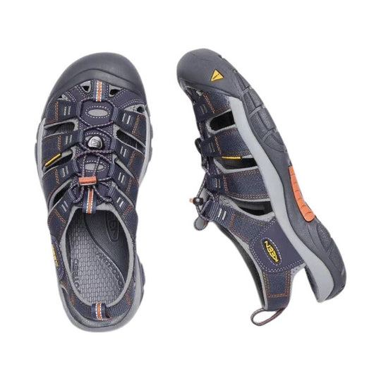 Dark gray closed-toe hiking sandal with mesh upper, bungee lacing, and orange accents