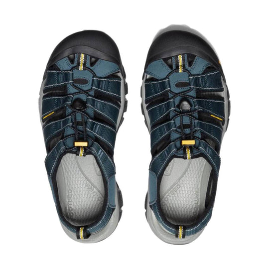 Blue and black closed-toe hiking sandal with adjustable straps and a thick rubber toe cap