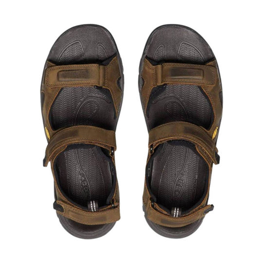Brown and black hiking sandals with adjustable straps, open toes, and cushioned footbeds