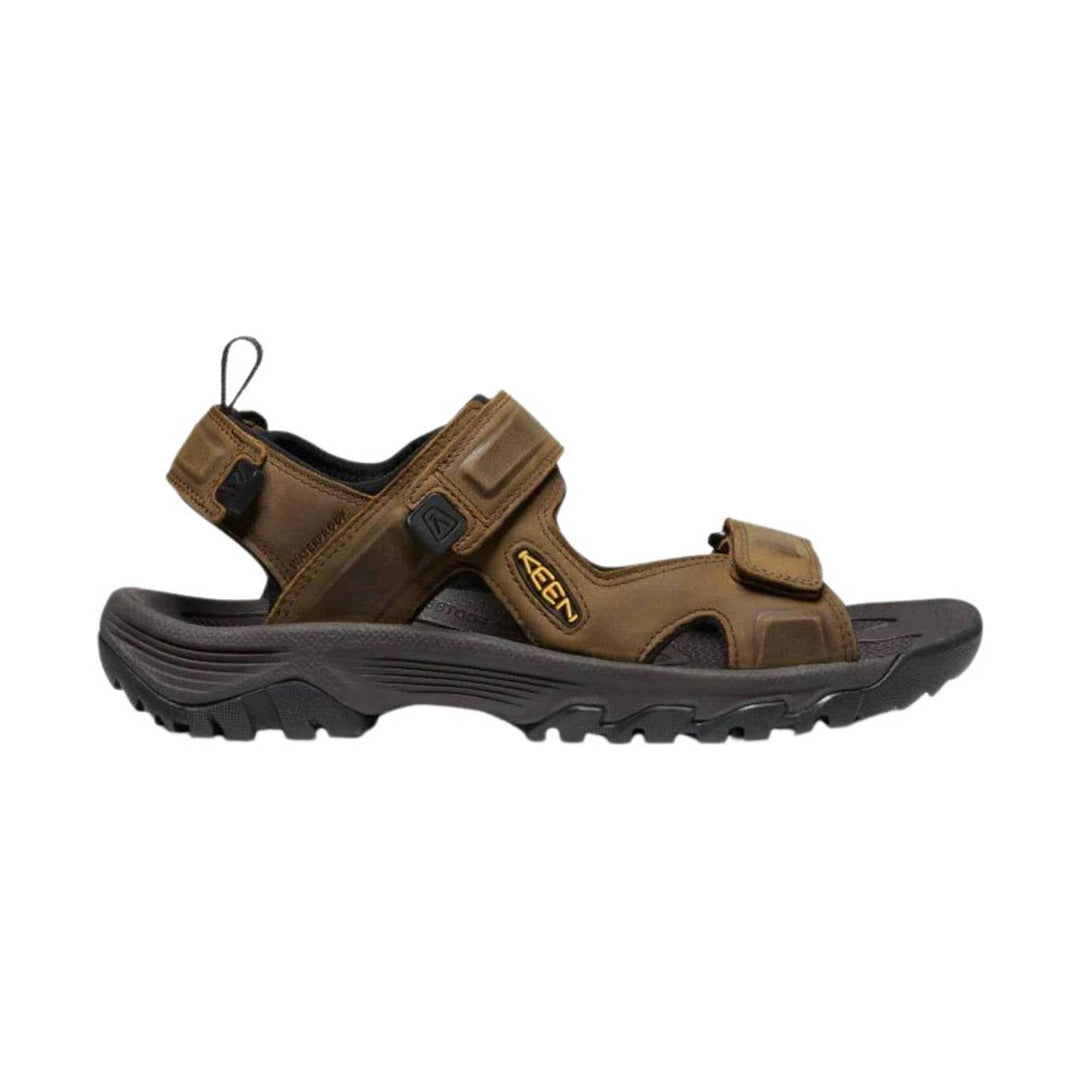 Brown closed-toe hiking sandal with black outsole, hook-and-loop straps, and KEEN logo