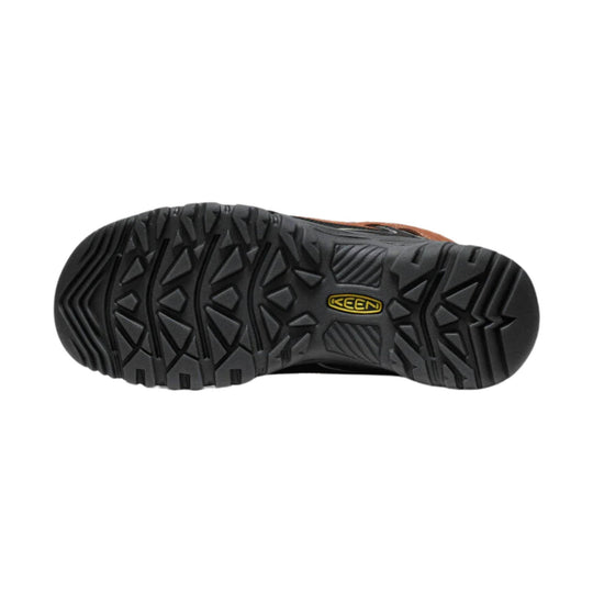Black hiking boot outsole with deep traction lugs and KEEN logo