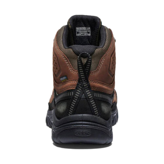 Brown and black hiking boot shown from the back with a pull loop and KEEN logo on the heel.