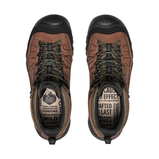 Pair of brown and black hiking boots shown from above with bungee laces and visible footbeds