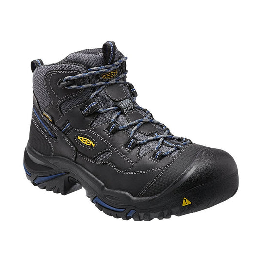 Black and gray mid-cut work boot with blue laces, reinforced toe, and rugged tread