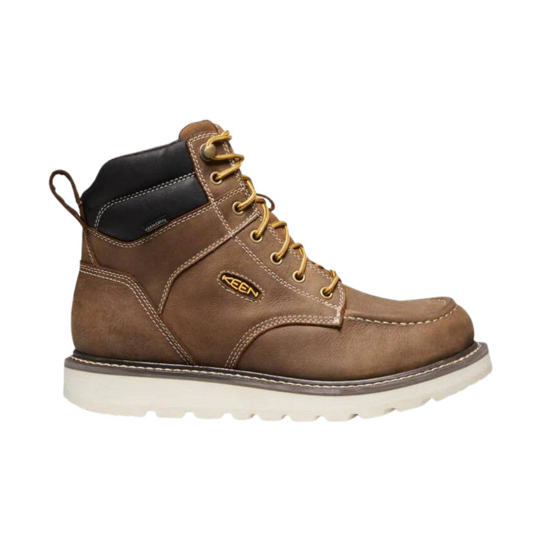 Brown leather lace-up work boot with black padded collar and white lug sole