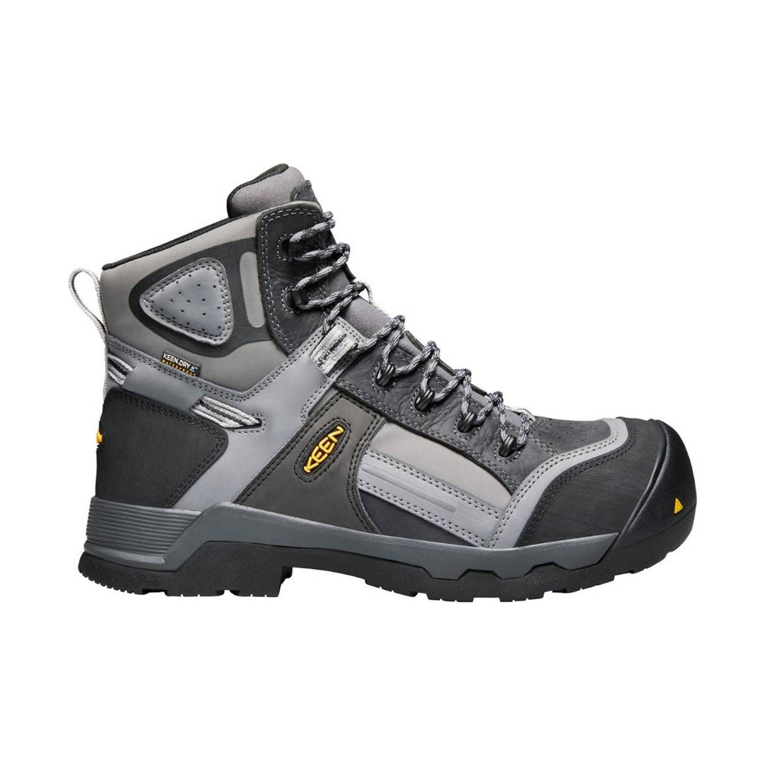 Gray and black insulated hiking work boot with yellow KEEN logo, lug sole, and metal lace hooks