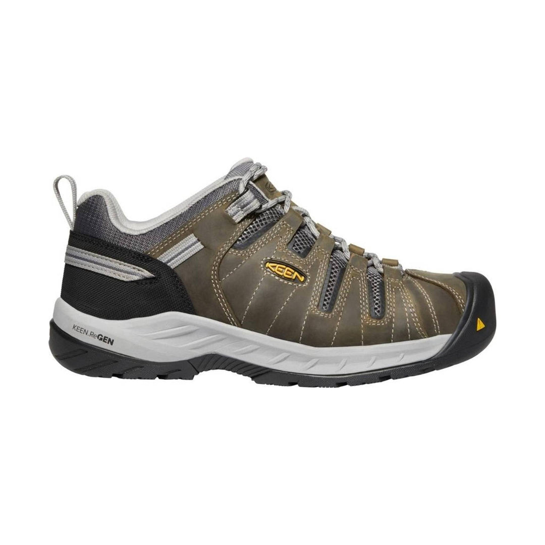 Brown and gray low-cut work shoe with bungee laces, mesh panels, and a black toe cap