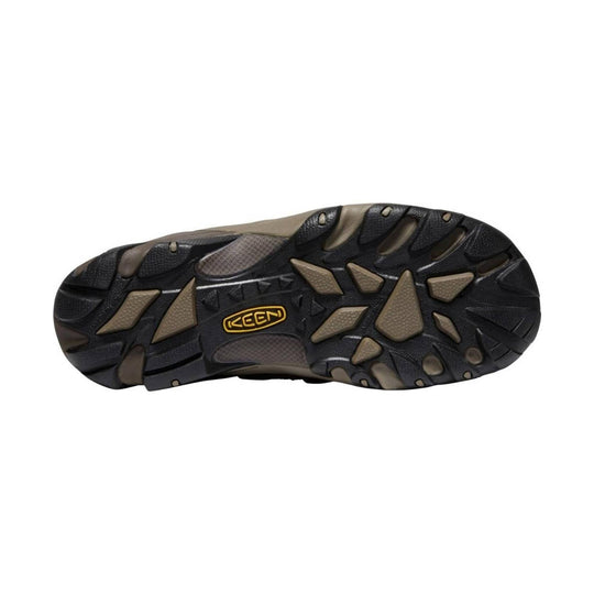 Black and brown work shoe outsole with rugged traction lugs and KEEN logo