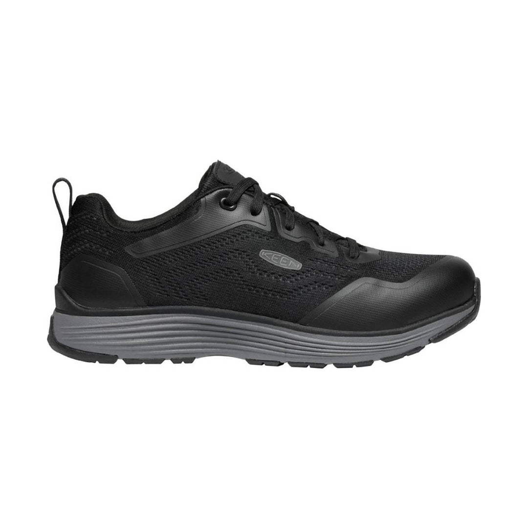 Black low-top work shoe with lace-up design and a gray cushioned sole