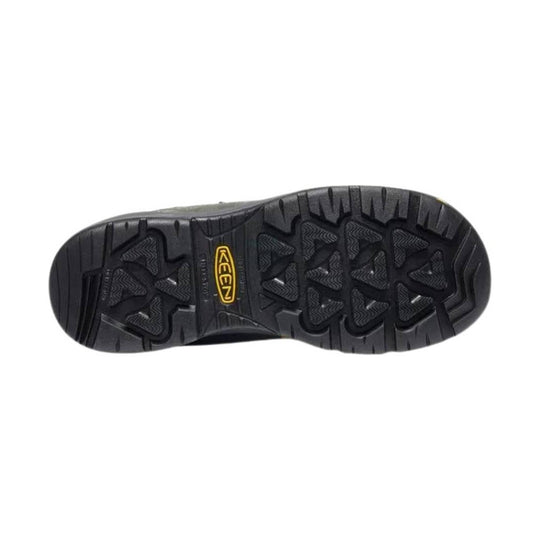 Black boot outsole with deep tread and KEEN logo in yellow