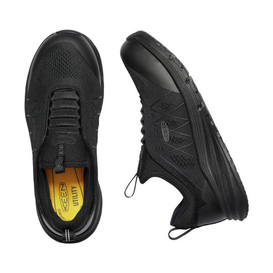 Black low-top work shoes with knit uppers and thick soles, shown top and side view