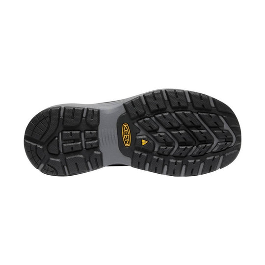 Black rugged work shoe outsole with deep tread and KEEN logo