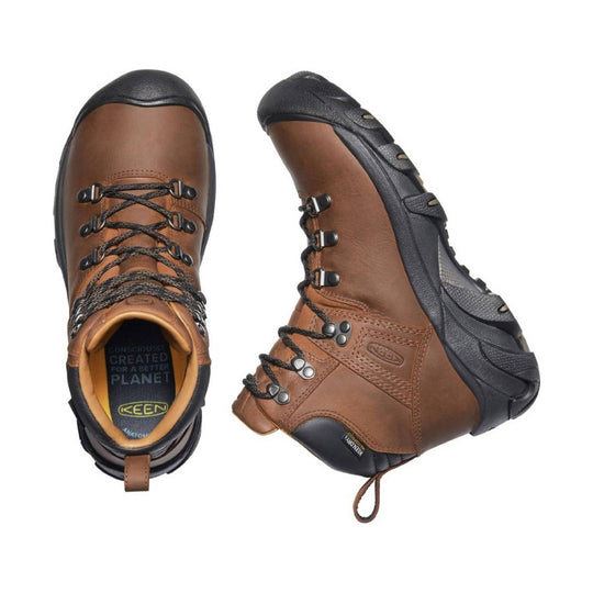 Brown leather hiking boot with black rubber toe cap, bungee laces, and lug sole, shown from top and side