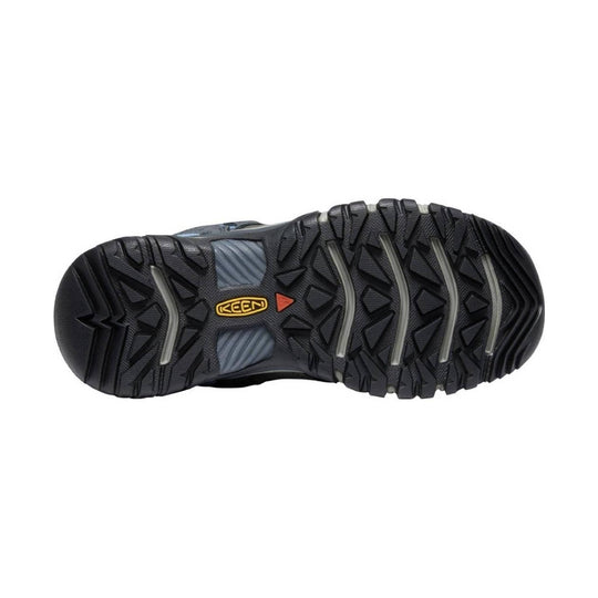 Black rugged hiking boot outsole with deep lug tread and KEEN logo