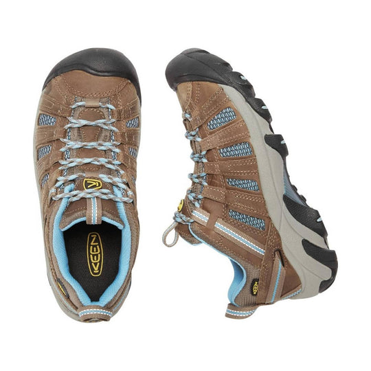 Brown closed-toe hiking shoe with blue accents, mesh side panels, and black toe cap