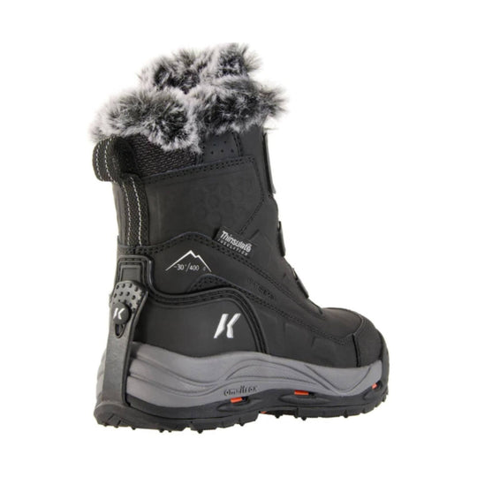 Black winter boot with faux fur cuff, side pull loop, gray sole, and visible K logo and Thinsulate label.