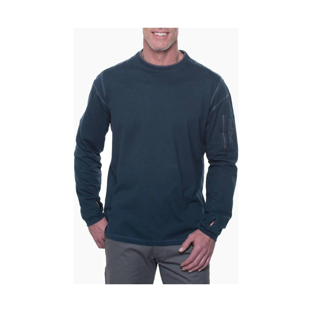 Dark long-sleeve crew neck shirt with a small zip pocket on the left sleeve