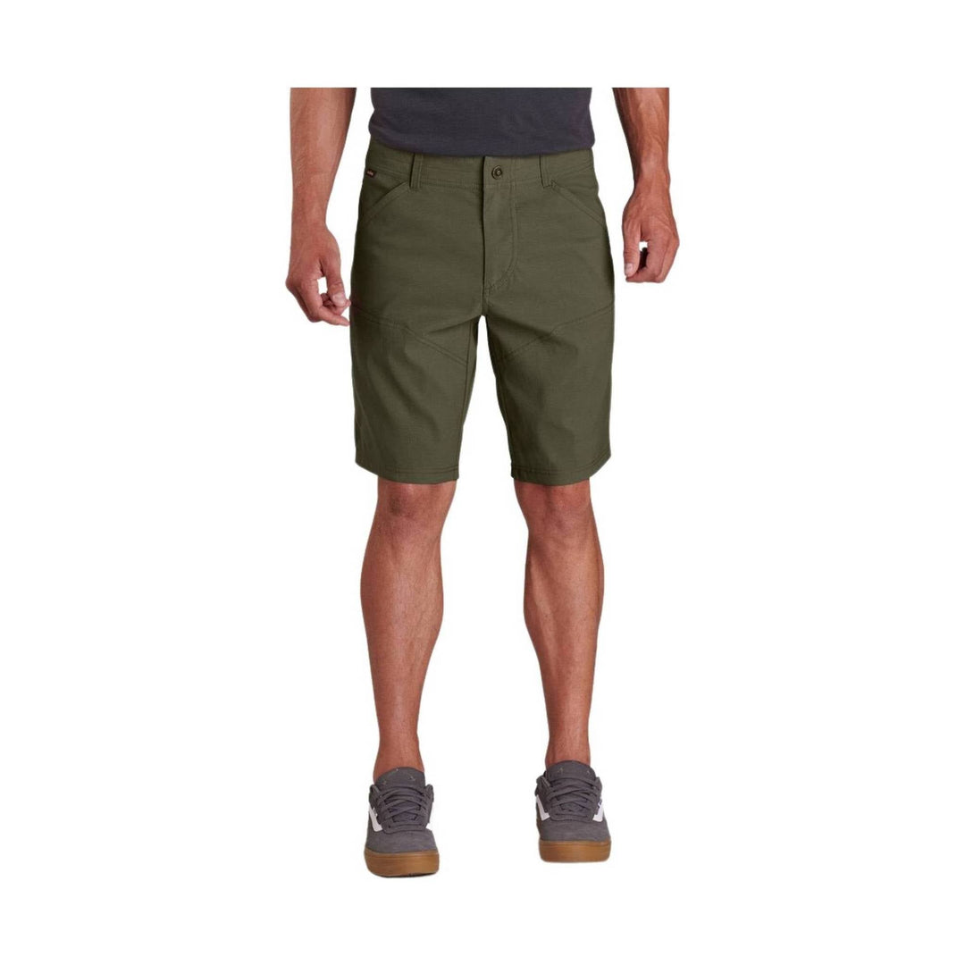 Olive green knee-length shorts worn by a model