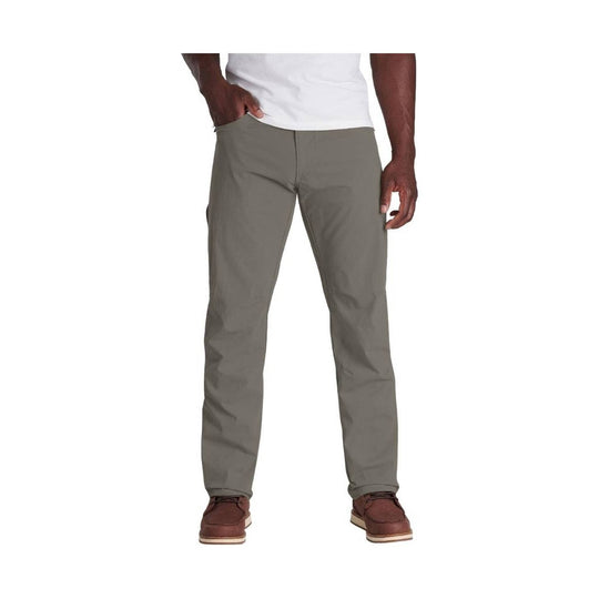 Gray slim-fit stretch pants on a model, shown full length with straight legs and front pockets