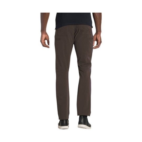 Brown straight-leg pants shown from the back with rear pockets and black shoes