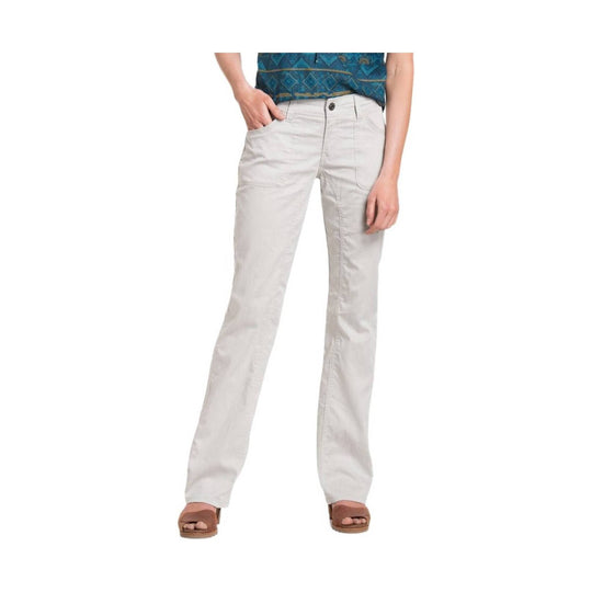 Light-colored straight-leg pants with front pockets and a zip fly, worn with brown wedge sandals