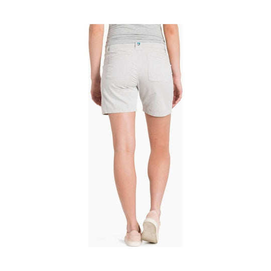 Light gray women’s shorts shown from the back with back pockets and a small logo patch at the waistband.