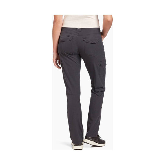 Dark gray women’s cargo hiking pants shown from the back with roll-up hems and side leg pocket