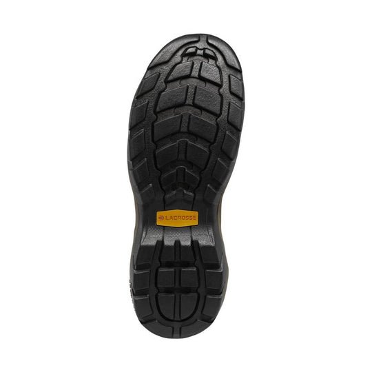 Black boot outsole with deep tread and a small yellow LaCrosse logo insert