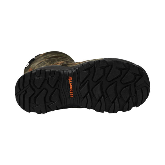 Camouflage rubber winter boot sole with deep tread and orange Lacrosse logo
