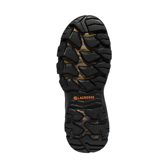 Black lugged boot sole with camouflage midfoot and orange LACROSSE logo