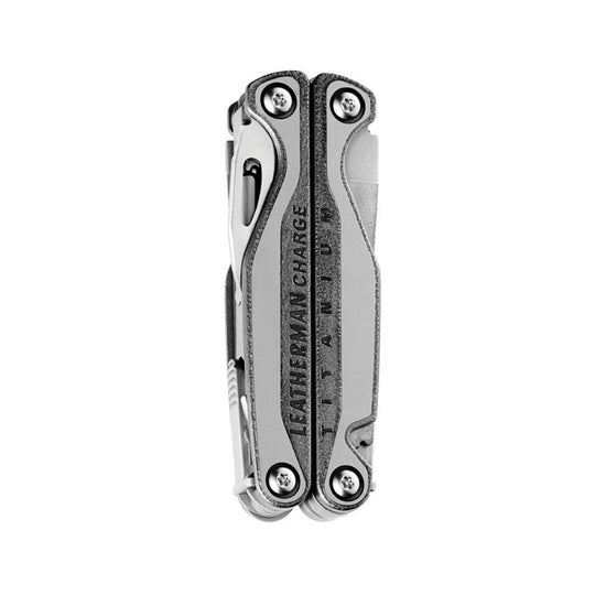 Closed silver multitool with LEATHERMAN CHARGE TITANIUM text and visible screw details