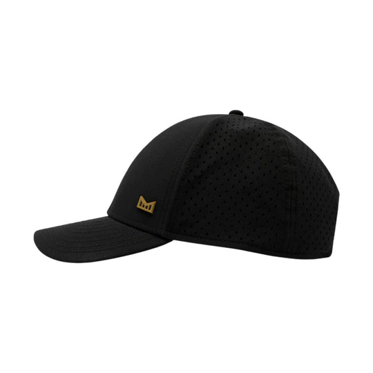 Black perforated baseball cap with a curved brim and small gold logo on the front