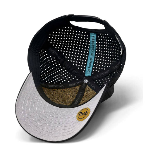 Black baseball cap with a light gray underside, perforated black crown lining, and a teal "DESIGNED IN CALIFORNIA" tag