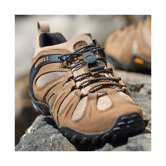 Brown hiking shoe with mesh panels, black bungee laces, and a Merrell logo on the side