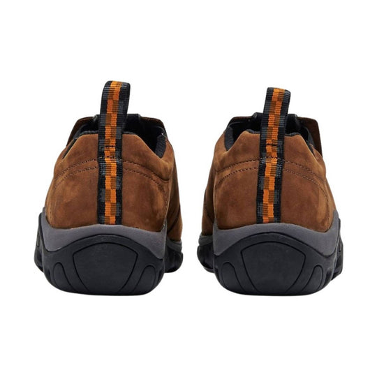Brown nubuck slip-on shoes with black soles and orange pull tabs, shown from the back