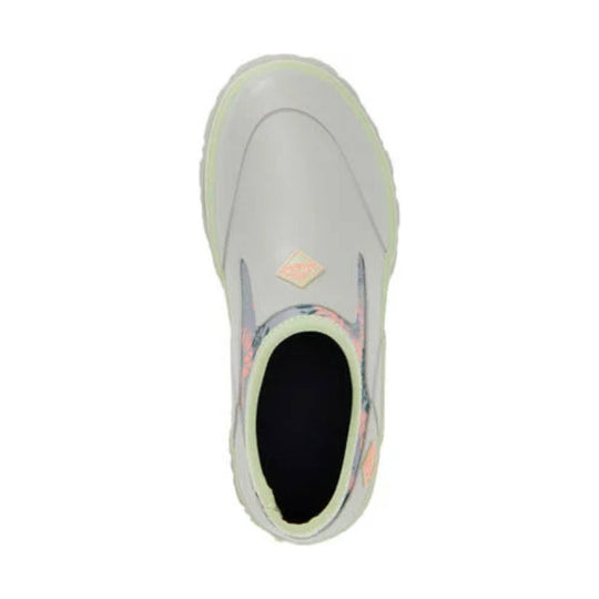 Light gray slip-on shoe with a high collar, pale green trim, and floral accents around the opening, shown from above