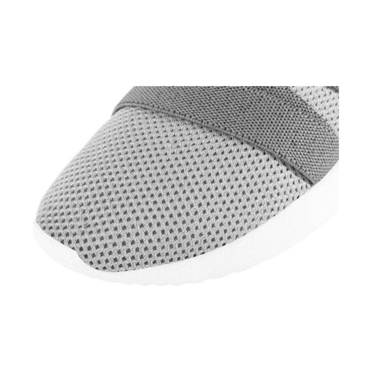 Gray knit toddler sneaker with a white sole and mesh upper, shown in close-up side view