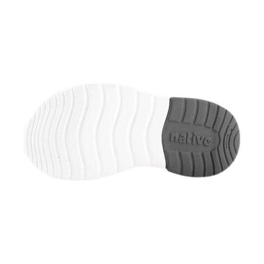 White and gray shoe outsole with grooved tread and embossed native logo