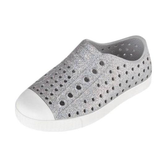 Silver glitter slip-on sneaker with black ventilation holes and white sole
